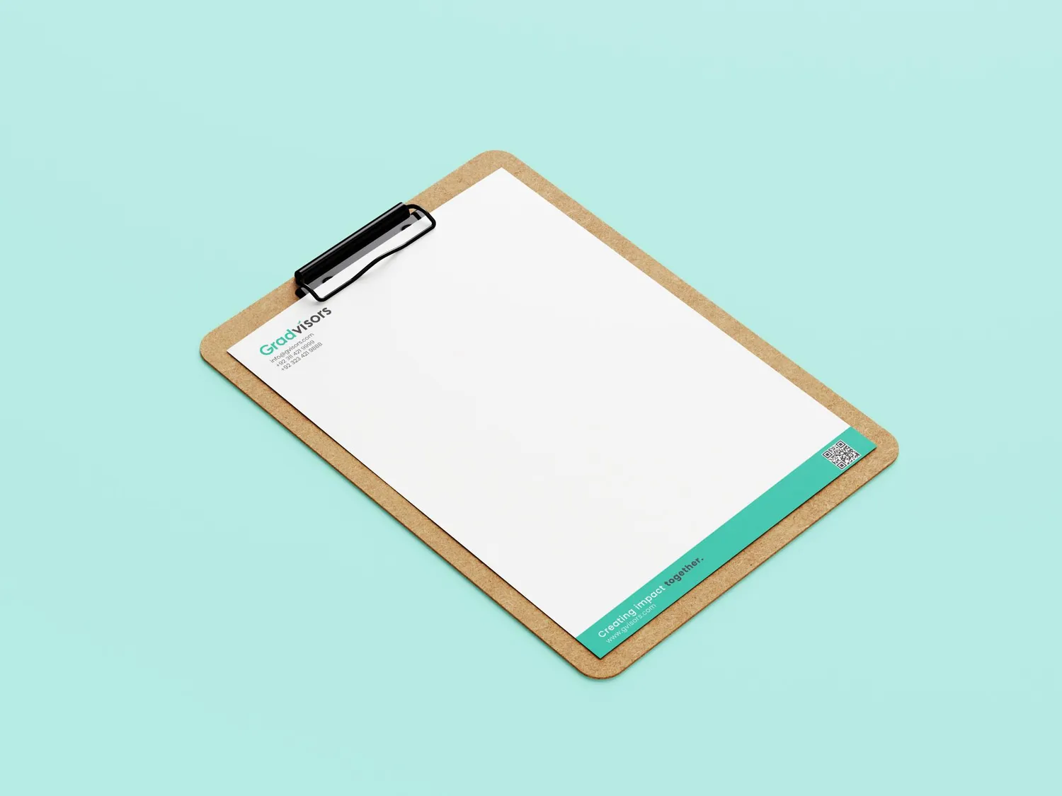 Letterhead on a wooden clipboard with a mint footer band and the Gradvisors mark