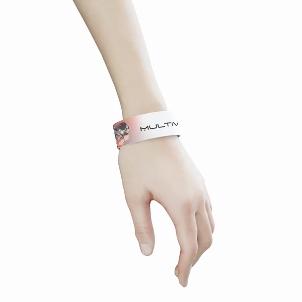 A festival wristband on a wrist, printed with the wordmark over the terracotta gradient