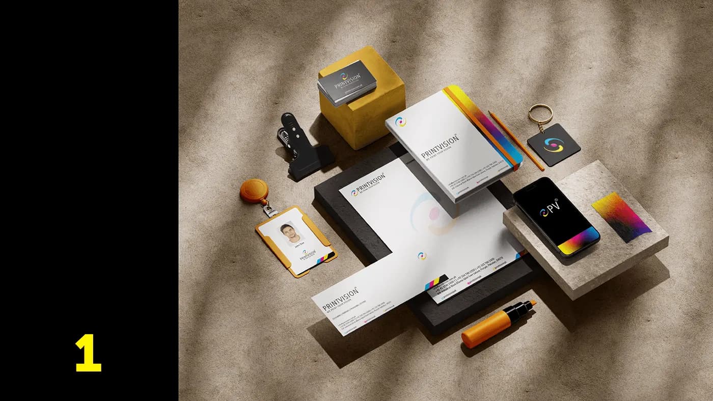 Stationery flatlay: business cards, letterhead, company profile, ID badge, keyring and phone