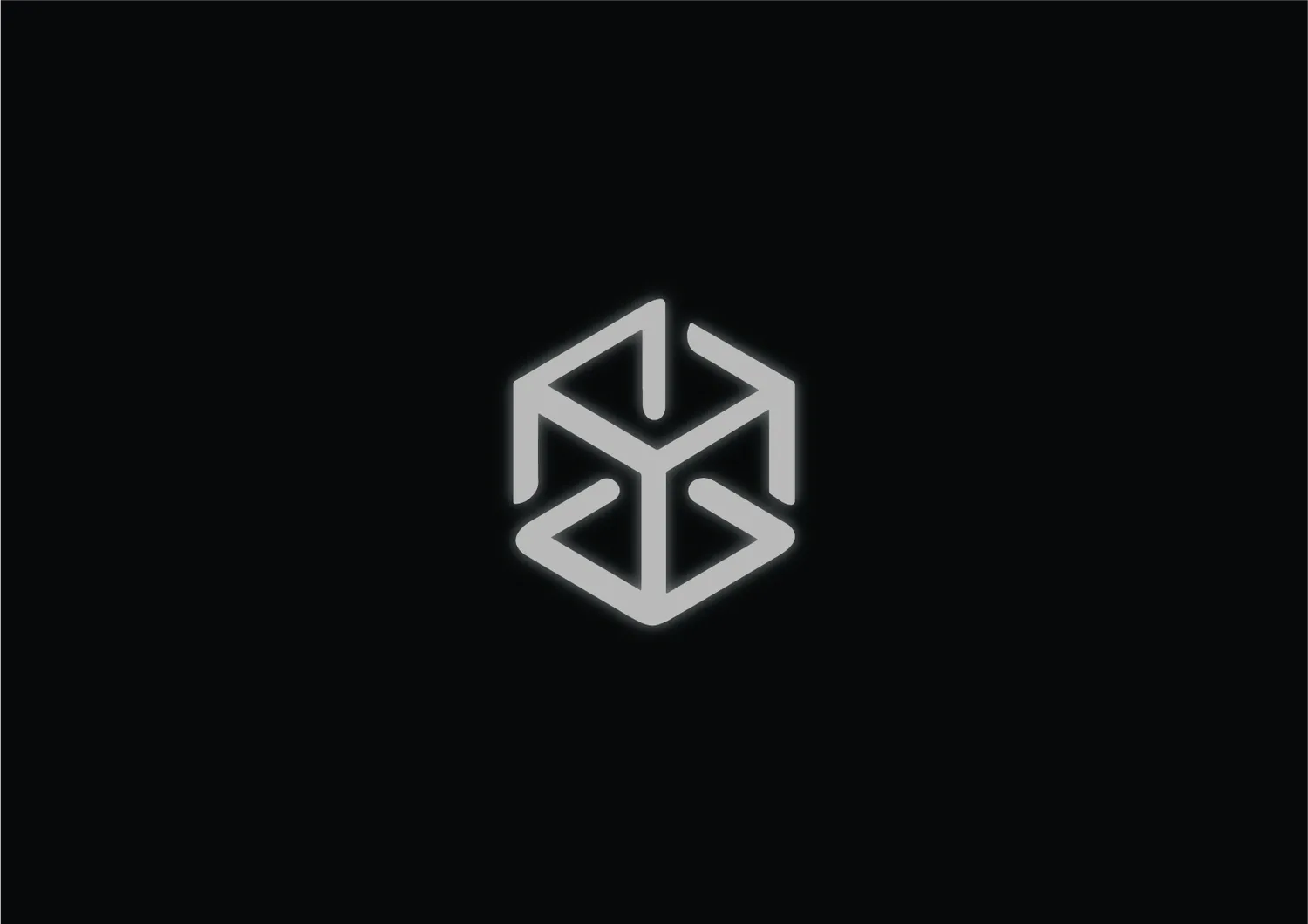 The TGS monogram, an angular cube built from interlocking forms, in white on black